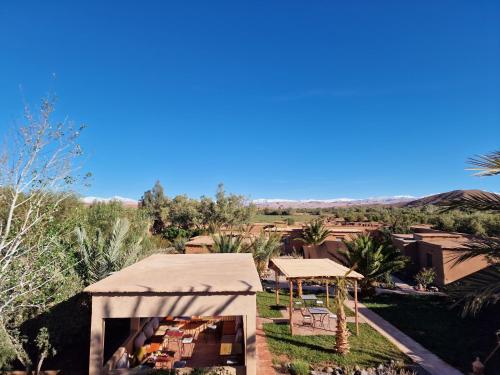a view of the desert from the roof of a tent at Maison d'hôtes Tigminou - Adults Only in Aït Ben Haddou