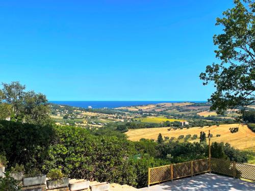 a view of the countryside from a house at Villa Lucilla - B&B Rooms and Pool in Potenza Picena
