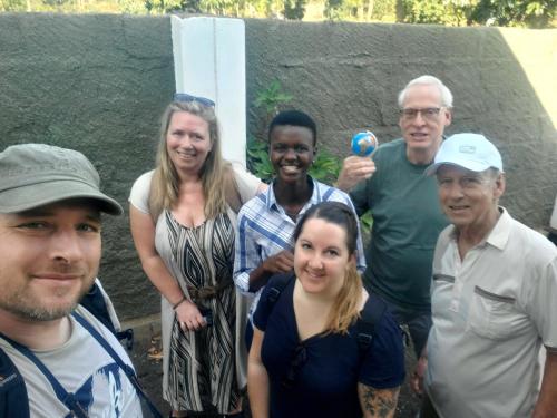 a group of people posing for a picture at Tumaini Homes in Himo
