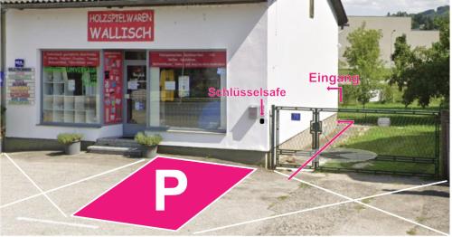 a pink stop sign in front of a building at Apartment Helga in Neulengbach