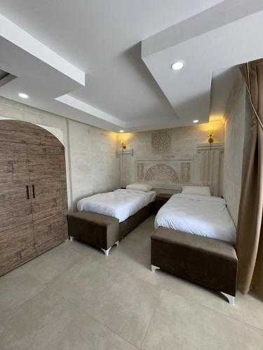 Postel nebo postele na pokoji v ubytování Lalişa Otel