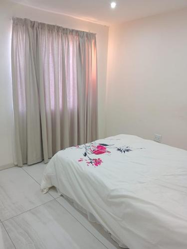 Katil atau katil-katil dalam bilik di Mount View Apartment