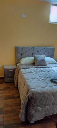 Postel nebo postele na pokoji v ubytování Mini department, family