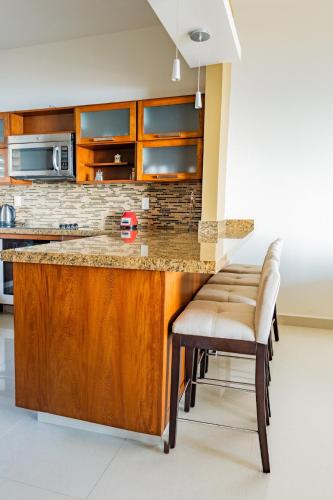 Kuchyň nebo kuchyňský kout v ubytování Oceanview Condo - PuntaArrocito C201