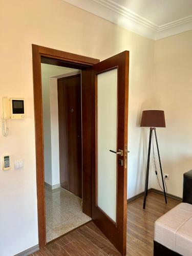an open door in a room with a lamp at Casablanca in Sutomore