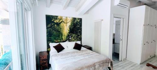 A bed or beds in a room at Casa Sabina