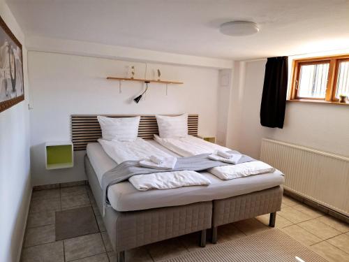 Postel nebo postele na pokoji v ubytování COZY VOGI Flat
