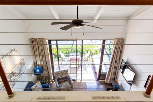 a view of a living room with a ceiling fan at Maalaea Banyans 416 by Coldwell Banker Island Vacations in Wailuku