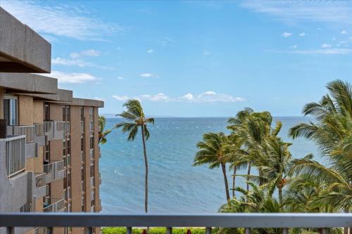 a view of the ocean from the balcony of a building at Nani Kai Hale 604 by Coldwell Banker Island Vacations in Kihei