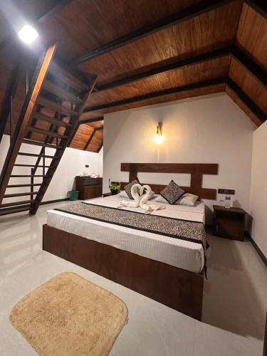 Postel nebo postele na pokoji v ubytování Divine Eco Resort