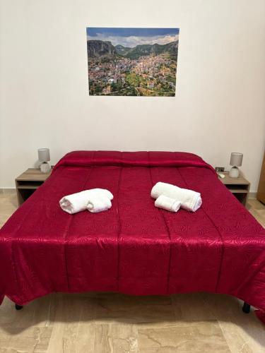 Una cama o camas en una habitación de Il Rifugio delle Cascate