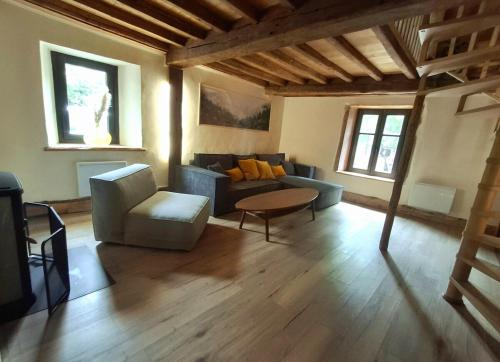 Un lugar para sentarse en Gîte de la ferme Alter Native