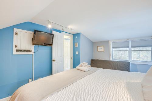 a bedroom with blue walls and a large bed at Home 2 Mi to Mt Snow Ski, Fish and Hike! in Wardsboro