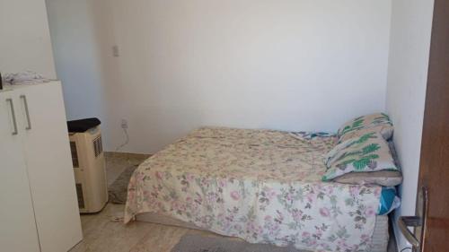 Postel nebo postele na pokoji v ubytování Espaço Luma Decorart