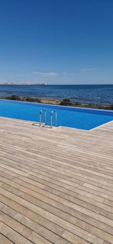 Posidonia Apartment, ground floor with garden,3 swimming pools, jacuzzi,parking space