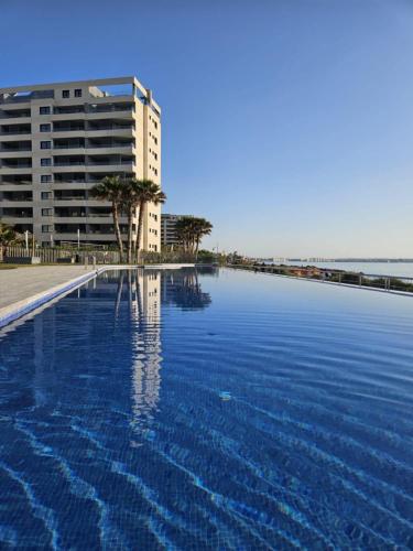Posidonia Apartment, ground floor with garden,3 swimming pools, jacuzzi,parking space