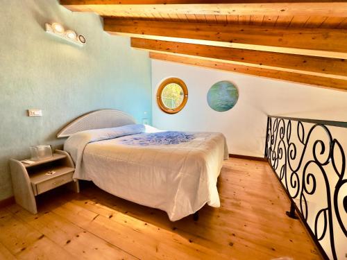 Postel nebo postele na pokoji v ubytování Cinqueterre Residence