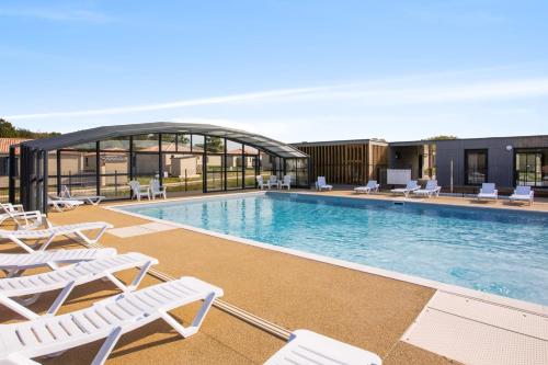 Agréable cottage pour 5 personnes dans un parc résidentiel pour des vacances reposantes en famille