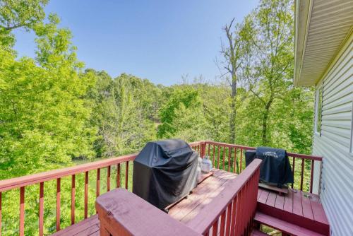 a deck with two trash bags on top of it at Lakefront Retreat - Near Trails & Family Fun in Bella Vista