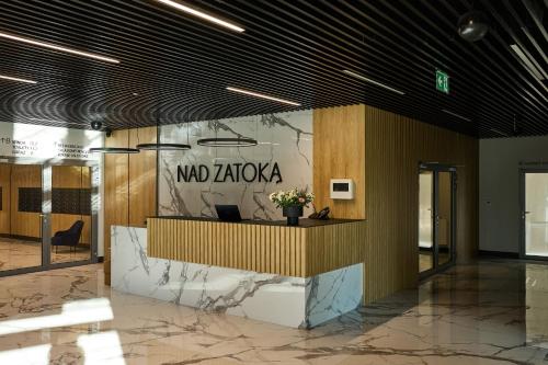 Ο χώρος του λόμπι ή της ρεσεψιόν στο Apartament z widokiem na jezioro Ukiel i Przystań