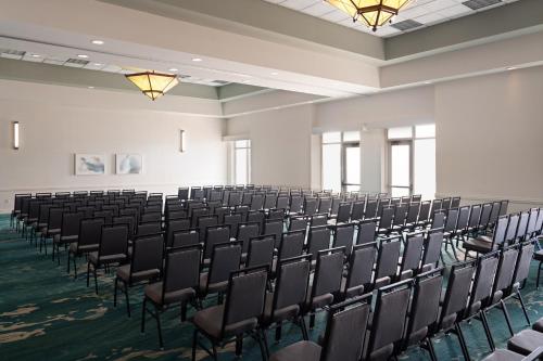 an empty room with rows of chairs in it at Embassy Suites San Marcos Hotel Conference Center in San Marcos