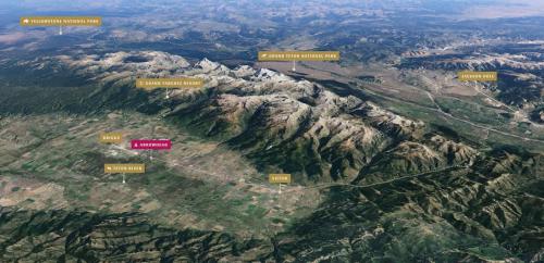 arial view of a mountain with many signs on it at Stylish Townhome Walkable Garage in Driggs