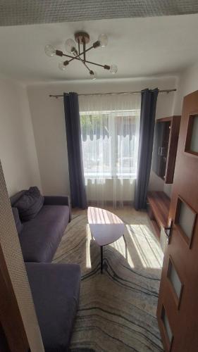 Katil atau katil-katil dalam bilik di Apartamentai Zibutės