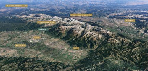an aerial view of a mountain with signs on it at Tranquil Retreat Hot Tub Shuttle in Driggs