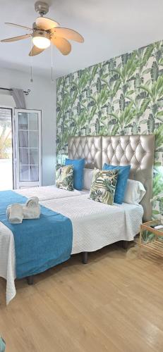 Ένα ή περισσότερα κρεβάτια σε δωμάτιο στο Candisol Cozy Inns