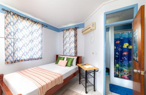 Postel nebo postele na pokoji v ubytování Safari Apartments