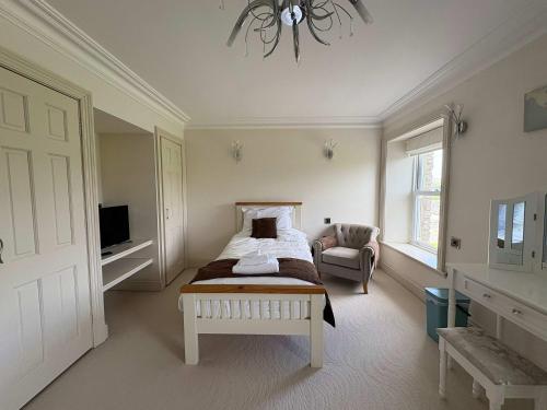 Estatesmen Lodge, Hillside Farmにあるベッド