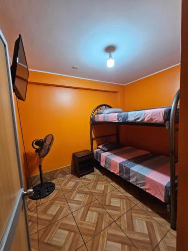 Hostal copa Arica 2にあるベッド
