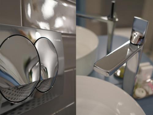 a bathroom with a mirror next to a toilet at Quinta de Raj - Your Douro Valley Retreat in Peso da Régua
