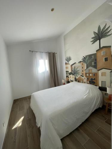 Ένα ή περισσότερα κρεβάτια σε δωμάτιο στο Appartement Terrasse