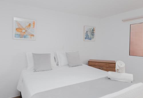 Postel nebo postele na pokoji v ubytování Hotel Molino de Viento