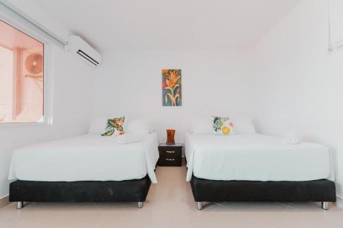 Postel nebo postele na pokoji v ubytování Hotel Molino de Viento