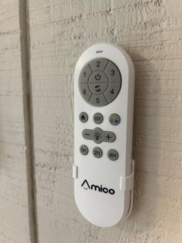 a remote control is attached to a wall at Rivers Edge - On the River, Breathtaking views! in Front Royal