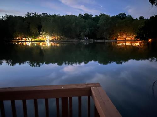 a view of a large lake at night at Rivers Edge - On the River, Breathtaking views! in Front Royal