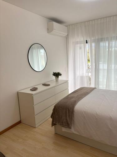 Ένα ή περισσότερα κρεβάτια σε δωμάτιο στο Cosy Home Azores