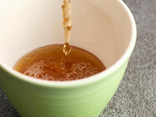 a drink being poured into a bowl of coffee at Hotel Resol Trinity Kanazawa in Kanazawa