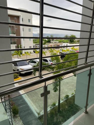 Ein Balkon oder eine Terrasse in der Unterkunft Modern Apt in Santiago w Pool, 3 Bedrooms, Air conditioner
