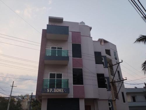 a building with colorful windows on the side of it at KSP Homes in Visakhapatnam