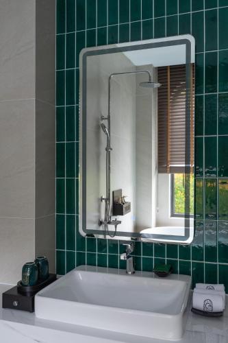 Ванная комната в Goldient Boutique Hotel