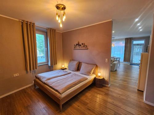 Ένα ή περισσότερα κρεβάτια σε δωμάτιο στο Apartment in Eifel near Hiking Trails