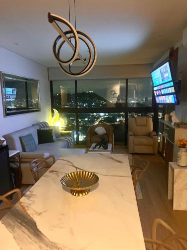 TV a/nebo společenská místnost v ubytování Murano centro 1 - 25 Floor byIMZ