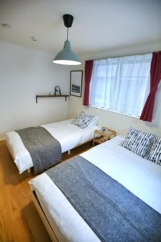 SCD155 Private House for 9 with Rooftop in Ikebukuro, Direct Access to Tokyo's Core Commercial Districts