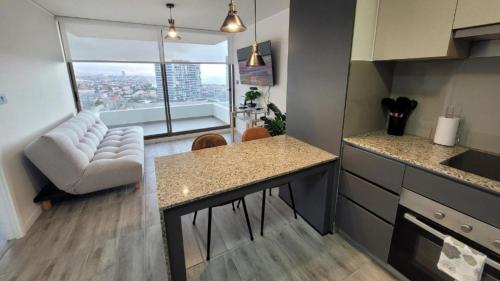 Cucina o angolo cottura di Hermoso departamento de 1D, terraza y vista al mar
