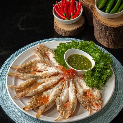 a plate of food with shrimp and lettuce and dip at Sanctuary Kanchanaburi in Ban Ai Hit
