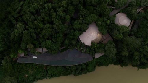 an overhead view of a house in a forest at Sanctuary Kanchanaburi in Ban Ai Hit