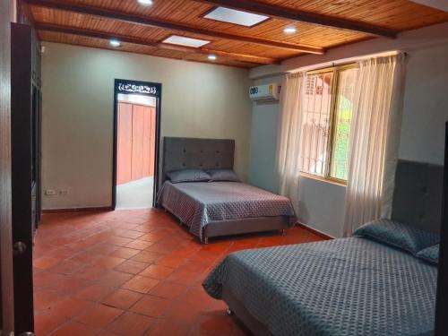 Ένα ή περισσότερα κρεβάτια σε δωμάτιο στο Casa grizzly